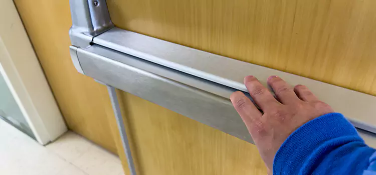 Installing a Push Bar on a Door The Woodlands